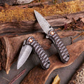 Fine Folding Damascus Steel Knife with Ebony Handle